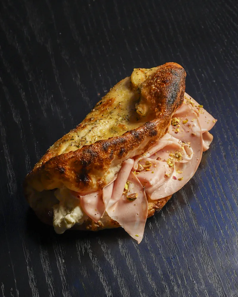 Folded focaccia filled with mortadella